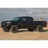 0-2.75 inch Lift Kit by ICON on a black 2016 Toyota Tacoma